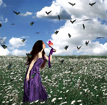 Woman in field of butterflies